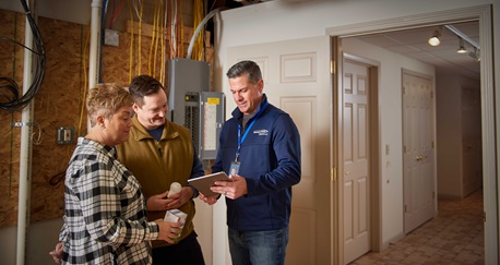consumers energy worker with homeowner
